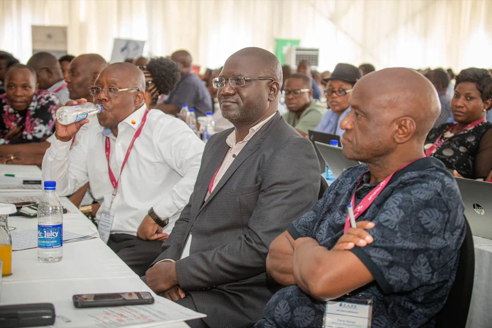 Delegates following a presentation at their tables