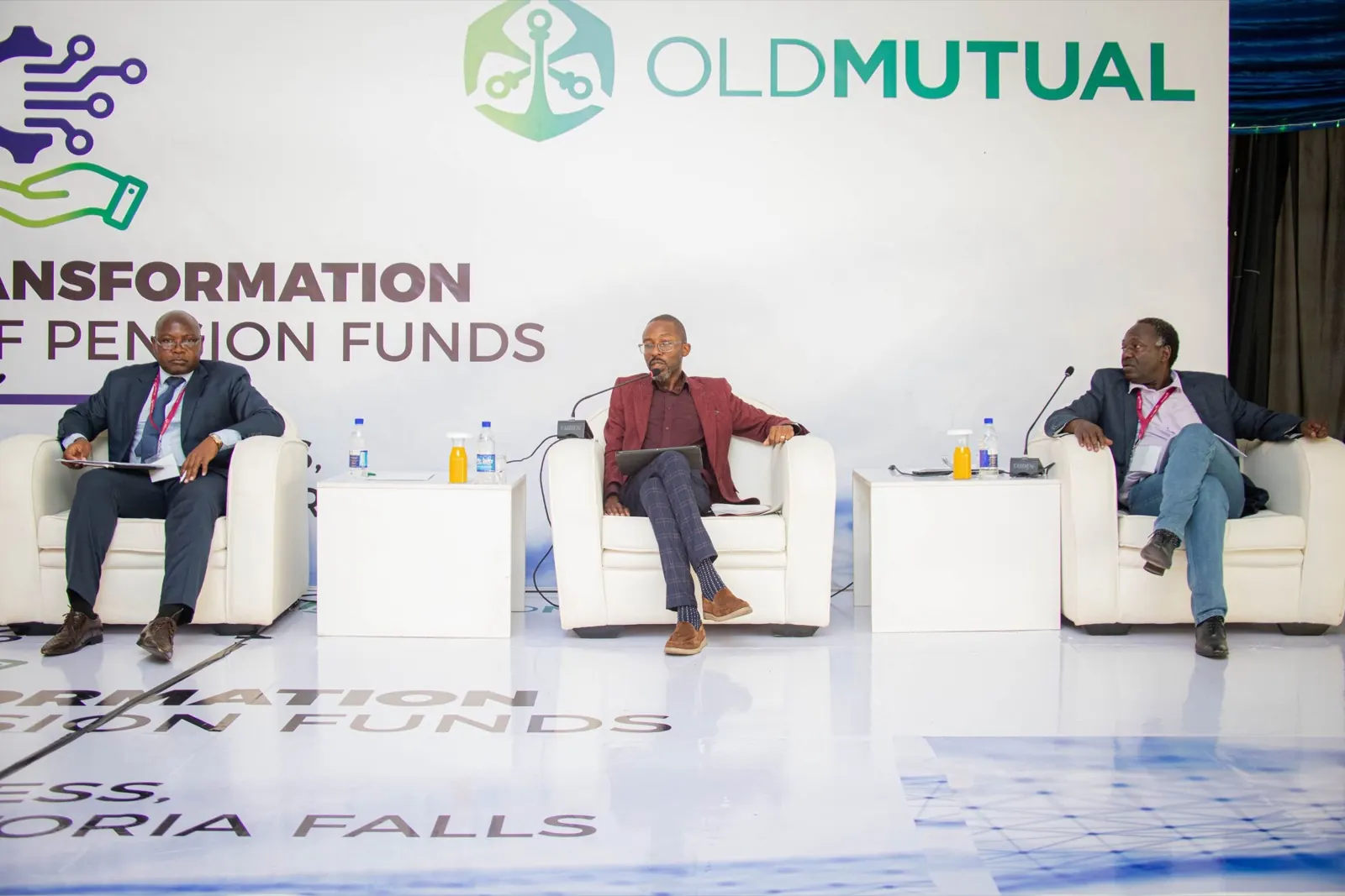 A panel discussion on stage about the future of pension funds